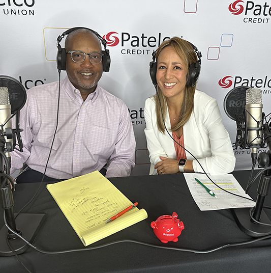 Patelco employees Michele Enriquez and Fred Williams at the podcast desk